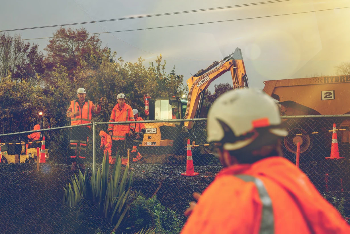 civil engineers on site dressed in ppe with CB Civil machinery